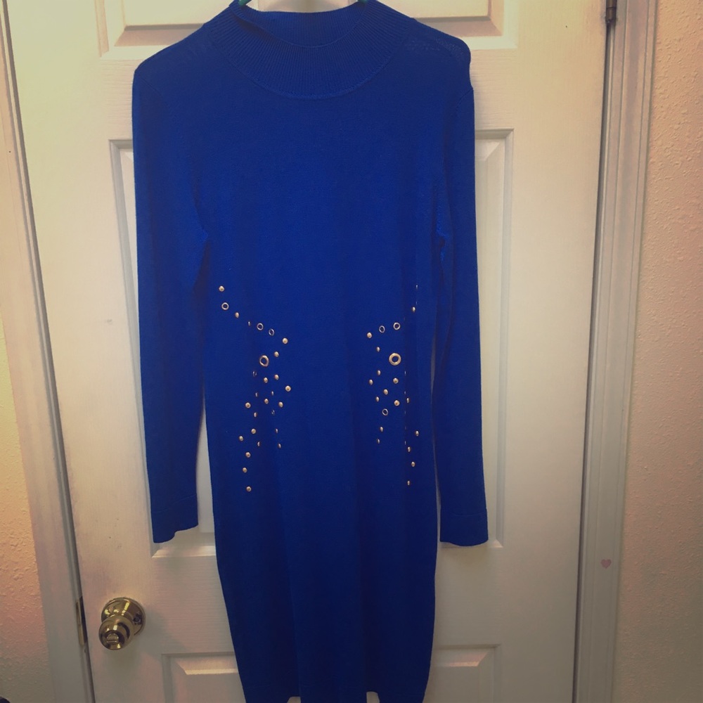 Form fitting dress with gold grommets